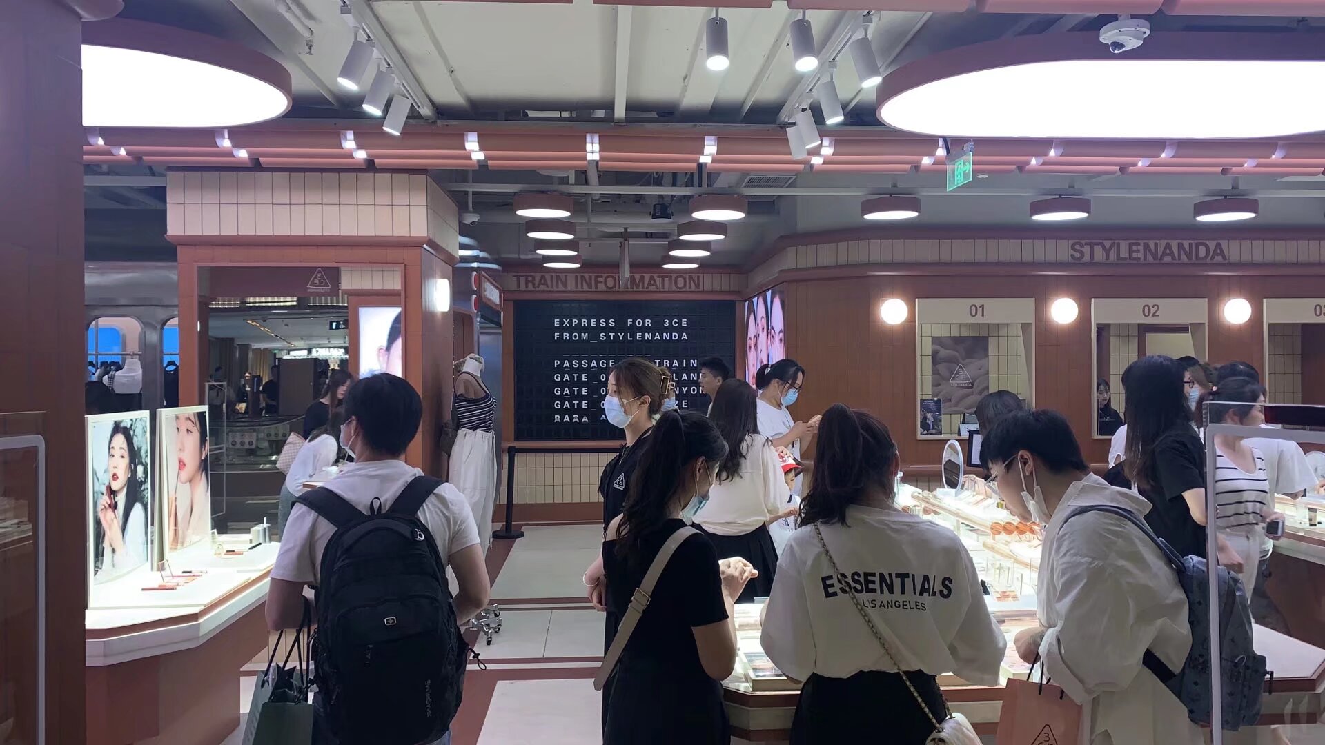 Train-station-inspired Split Flap Display inside the 3CE flagship store