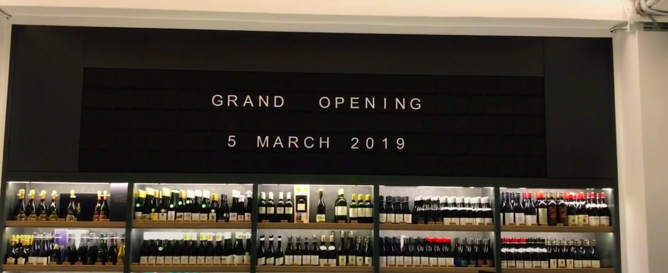 split flap display in a wine shop