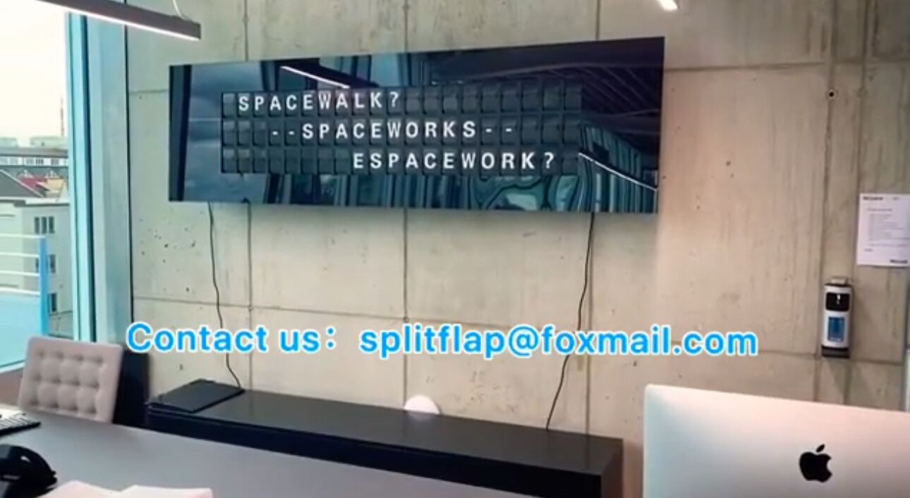 flip board display alphabet split flap display in a conference room