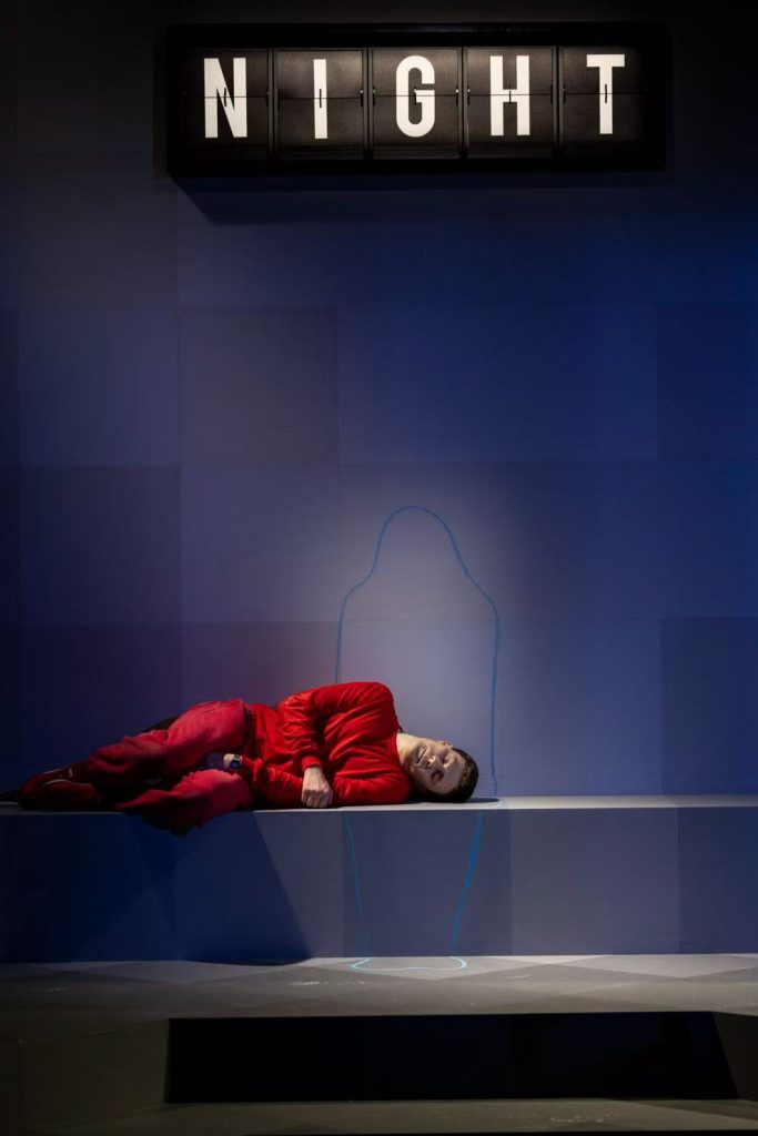 Split flap display showing NIGHT during Belvoir St Theatre stage performance