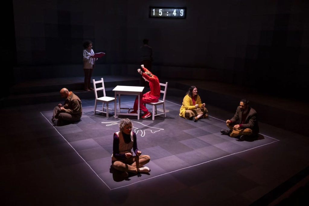 Custom split flap display integrated into theatre set design
