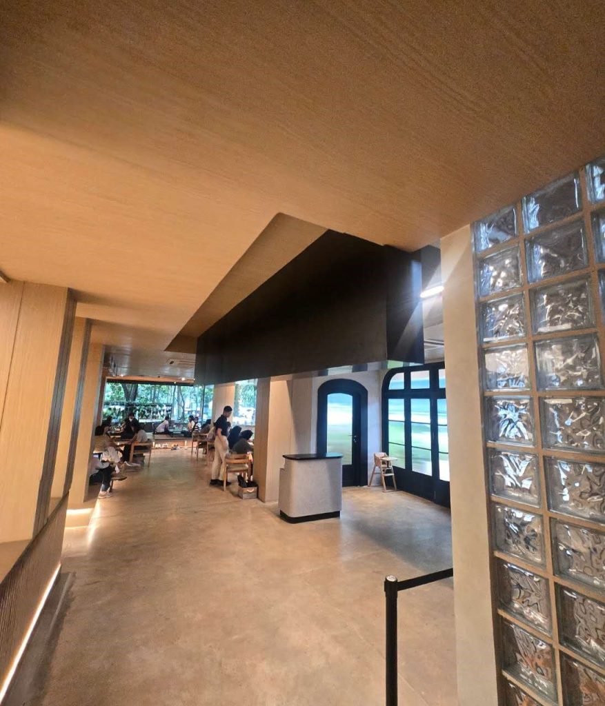 Split flap display integrated into modern café interior in Indonesia