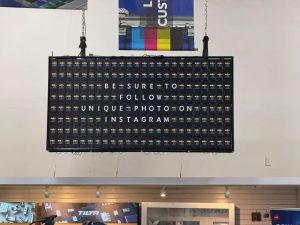 Split flap display installed at Unique Photo in Fairfield New Jersey